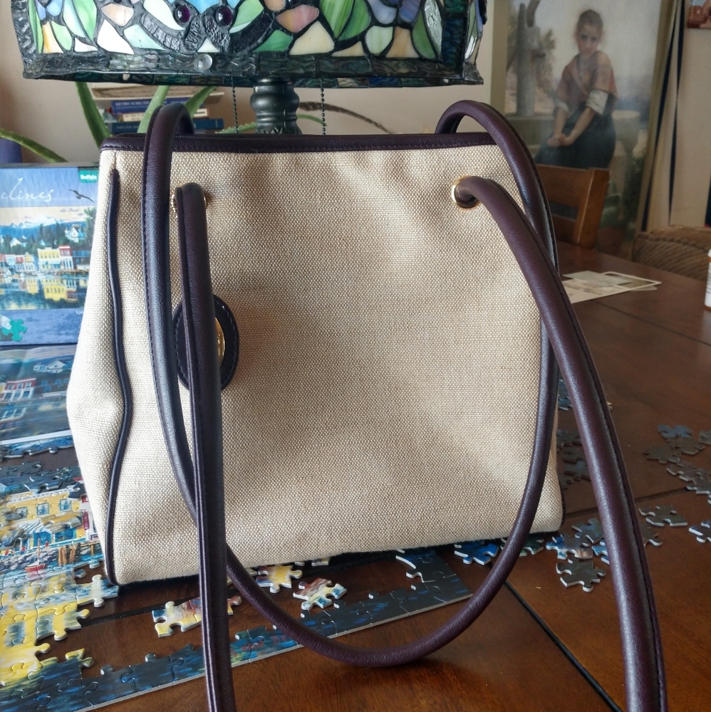 Etienne Aigner canvas and leather purse.